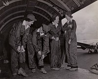 Activities of flight nurses aboard a Skymaster attached to Naval Air Transportation Service Pacific Wing Evacuation Squadron, Naval Air Station, Honolulu, Territory of Hawaii.
