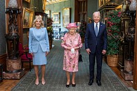 President Joe Biden and First Lady Jill Biden pose for an official photo with Queen Elizabeth II in the Grand Corridor of Windsor Castle on Sunday, June 13, 2021, in Windsor, England. (Official White House Photo by Adam Schultz). Original public domain image from Flickr