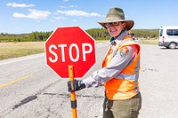 Directing traffic to patch pot holes near Canyon Junction by Jacob W. Frank. Original public domain image from Flickr