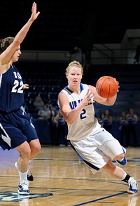 U.S. Air Force Academy Falcons sophomore guard Alicia Leipprandt, right, charges past Brigham Young University senior guard Mindy Bonham as the Falcons take on the BYU Cougars at the academy?s Clune Arena in Colorado Springs, Colo., Jan. 8, 2011.