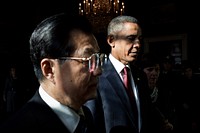 President Barack Obama and President Hu Jintao of China wait in the Green Room of the White House before their press conference in the East Room, Jan. 19, 2011.