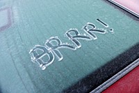 Brrr! written on a frozen glass window. Original public domain image from Flickr