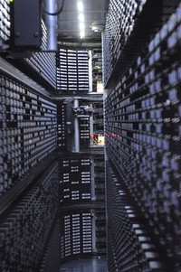 Interior of StorageTek tape library at NERSC. Free public domain CC0 image.
