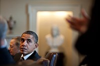 President Barack Obama listens to remarks by Senior Advisor David Plouffe during a Cabinet meeting in the Cabinet Room of the White House, Jan. 31, 2012.