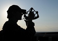 U.S. Navy Ensign Kelly Quirk uses a stadimeter sextant to take a range finding from the port bridge wing of the frigate USS Underwood (FFG 36) during a Composite Training Unit Exercise in the Atlantic Ocean, April 24, 2012.