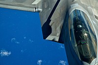 A U.S. Airman with the 199th Fighter Squadron, Hawaii Air National Guard out of Joint Base Pearl Harbor-Hickam, Hawaii flies an F-22 Raptor aircraft, March 27, 2012, during a refueling mission over the Hawaiian Islands.
