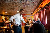 President Barack Obama greets patrons at the Sink Restaurant & Bar in Boulder, Colo., April 24, 2012.