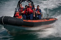 U.S. Coast Guardsmen assigned to medium endurance cutter USCGC Escanaba (WMEC 907) navigate alongside the cutter in a rubber response boat in the Atlantic Ocean Sept. 20, 2012, during Unitas Atlantic phase 53-12.