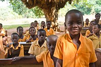 Ghana school under the trees. School under the trees in the Northern Region Ghana. (USAID/A. Kauffeld). Original public domain image from Flickr