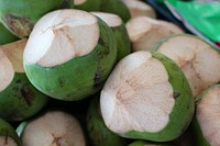 Alajuela's public market. Green Coconuts (el coco). Alajuela, Costa Rica.