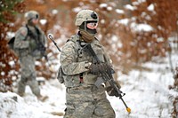 U.S. Army Sgt. Kyle Zeller, with Kilo Troop, 3rd Squadron, 2nd Cavalry Regiment, moves through wooded terrain during a squad level training exercise Feb. 12, 2013, at Grafenwoehr Training Area in Grafenwoehr, Germany.