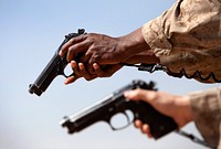 Pistol. U.S. Marines assigned to Mobile Strike Force Team, II Marine Headquarters Group, II Marine Expeditionary Force, conduct live-fire training on Camp Leatherneck, Helmand province, Afghanistan.