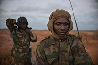 A tank operator readies himself before an advance towards an enemy position on February 23 near the town of Leego in central Somalia.