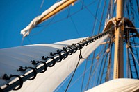 ATLANTIC OCEAN -- Crewmembers and officer candidates man their sail stations aboard Coast Guard Cutter Eagle March 9, 2013. The officer candidates spent two weeks aboard the Eagle during their 17-week course to further develop their seamanship, teamwork and leadership skills. U.S. Coast Guard photo by Petty Officer 3rd Class Cory J. Mendenhall. Original public domain image from Flickr