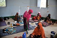 A woman sweeps the floor at a makeshift medical clinic in the city of Belet Weyne, Somalia, on March 30.