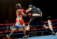 130406-192 NCBA Championship Finals MASHANTUCKET, Conn. -- U.S. Coast Guard Academy First Class cadet Josh Surgeon fights in the National Collegiate Boxing Association Championship Finals April 6, 2013 at Foxwoods Resort and Casino. Surgeon beat his opponent and earned a national title. U.S. Coast Guard photo by Petty Officer 3rd Class Cory J. Mendenhall. Original public domain image from Flickr