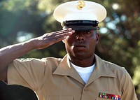 U.S. Marine Corps Sgt. Nathaniel Fowler, with Forward Coordination Element, Marine Rotational Force - Darwin, salutes as "Last Post," sounds at the USS Peary monument in Darwin, Australia, May 3, 2013, where a ceremony was held commemorating the 71st anniversary of the Battle of Coral Sea. (DoD photo by Sgt. Sarah Fiocco, U.S. Marine Corps/Released).