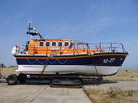 Boat docked by the port. Free public domain CC0 photo.