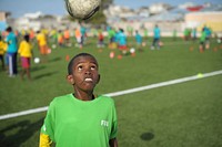 A child headers a ball during practice at the FIFA Football Festival in Mogadishu, Somalia, on August 19.