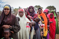 Women and children queue to enter a free medical clinic run by Ugandan and Burundian military personnel serving with the African Union Mission in Somalia (AMISOM) in Baidoa, the capital of Bay and Bakool region in central Somalia.