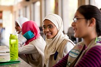 Girl Scouts ask questions about college life during their class on nuclear science. Photo by Matty Greene. Original public domain image from Flickr