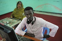 One of Radio Mogadishu's employees works a machine used to convert the archive's analog recordings into digital files on November 7 in Mogadishu, Somalia.