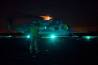 A U.S. Marine Corps CH-53E Super Stallion helicopter with the 22nd Marine Expeditionary Unit (MEU) prepares for takeoff aboard the amphibious assault ship USS Bataan (LHD 5) during a reconnaissance and surveillance exercise in the Atlantic Ocean Oct. 27, 2013.