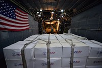 U.S. Airmen assigned to the 1st Special Operation Squadron unload U.S. Agency International Development supplies from an MC-130H Combat Talon II aircraft in Tacloban, Philippines, Nov. 20, 2013, during Operation Damayan.