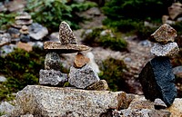 Inuksuk. Alaska.An inuksuk is a stone landmark or cairn built by humans, used by the Inuit, Inupiat, Kalaallit, Yupik, and other peoples of the Arctic region of North America. These structures are found from Alaska to Greenland. Original public domain image from Flickr