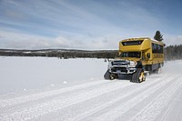 Snowcoach at Gibbon Meadows by Jim Peaco. Original public domain image from Flickr