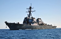 The guided missile destroyer USS Cole (DDG 67) approaches Mole Pier at Naval Air Station Key West, Fla., Jan. 19, 2014, for a port visit. (DoD photo by Mass Communication Specialist 2nd Class Brian Morales, U.S. Navy/Released). Original public domain image from Flickr