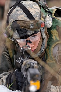 U.S. Army Pvt. Jonathan Gomez, a paratrooper assigned to Anvil Company, 1st Squadron, 91st Cavalry Regiment, 173rd Infantry Brigade Combat Team, provides security during a platoon-level maneuver exercise Feb. 6, 2014, at the Grafenwoehr Training Area in Grafenwoehr, Germany.