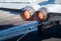 A U.S. Navy F/A-18C Hornet aircraft assigned to Strike Fighter Squadron (VFA) 37 catches an arresting gear wire on the flight deck of the aircraft carrier USS Harry S. Truman (CVN 75) in the Gulf of Oman Feb. 17, 2014.