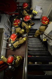 U.S. Sailors participate in a firefighting exercise aboard the amphibious transport dock ship USS Mesa Verde (LPD 19) in the Atlantic Ocean Feb. 20, 2014.
