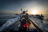 U.S. Sailors assigned to the amphibious transport dock ship USS San Diego (LPD 22) and Explosive Ordnance Disposal Mobile Unit (EODMU) 3 maneuver rigid-hull inflatable boats during small-boat operations in the Pacific Ocean Feb. 20, 2014.