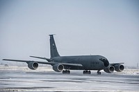 A U.S. Air Force KC-135 Stratotanker aircraft returns from the final refueling mission over Afghanistan at the Transit Center at Manas, Kyrgyzstan, Feb. 24, 2014. (DoD photo by Senior Airman George Goslin, U.S. Air Force/Released). Original public domain image from Flickr