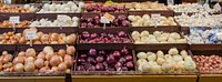 Onion and garlic produce at a grocery store in Fairfax, Virginia, on March 3, 2011. USDA Photo by Lance Cheung. Original public domain image from Flickr
