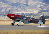 The Yak 3 was regarded as one of the finest interceptors of WWII and was nicknamed "Dogfighter Supreme." Luftwaffe pilots became accustomed to shooting down poorly equiped, hastily trained Russians.The Yak-3 entered service in 1944, constructed in plywood instead of fabric covering the rear fuselage, mastless radio antenna, reflector gunsight and improved armor and engine cooling. Armed with a single 20 mm ShVAK cannon and one 12.7 mm UBS machine gun, it was a forgiving, easy-to-handle aircraft loved by both rookie and veteran pilots and ground crew as well. It was robust, easy to maintain and was used mostly as a tactical fighter, flying low over battlefields and engaging in dogfights below 13,000 ft.The German pilots were horrified to find they were being bested by a well-flown, simple little 1300hp Russian fighter made of wood. It was found to be so much superior to the Focke-Wulf 190 and the ME-109 that consequently, the Luftwaffe issued an order to all squadrons saying, "avoid combat below ten thousand feet with Yakovlev fighters lacking an oil cooler intake beneath the nose!". Original public domain image from Flickr