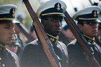 Coast Guard Academy cadets perform regimental review for Master Chief Petty Officer Lloyd Piece. 