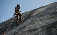 U.S. Air Force Senior Airman Dylan, a pararescueman with the 48th Air Expeditionary Group, rappels down the side of a glacier while participating in Icelandic Air Policing near Keflav?k, Iceland, May 18, 2014.