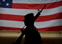 U.S. Air Force Senior Airman Jerick Encarnacion, with the 455th Expeditionary Logistics Readiness Squadron, prepares for a change of command ceremony at Bagram Airfield, Afghanistan, May 8, 2014.