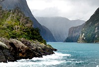 Milford Sound New Zealand.Visitors to Milford Sound will not be disappointed. It is truly spectacular, with scenery that has remained unchanged throughout the ages. Original public domain image from Flickr