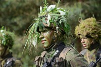 A Lithuanian basic training soldier stands ready to receive instruction from their drill sergeant during a training demonstration June 3, 2014, near Rukla, Lithuania.