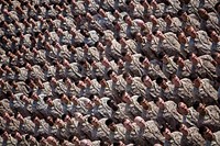 U.S. Marines and Sailors with the 22nd Marine Expeditionary Unit (MEU) stand at attention during a formation aboard the amphibious assault ship USS Bataan (LHD 5) in the Gulf of Aden May 13, 2014.