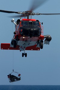U.S. Coast Guardsmen with Coast Guard Station San Diego participate in a search and rescue exercise (SAREX) in an HH-60J Jayhawk helicopter near Naval Auxiliary Landing Field San Clemente Island, Calif., May 21, 2014.