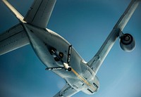 A U.S. Air Force KC-135 Stratotanker aircraft assigned to the 927th Air Refueling Wing flies overhead after refueling a C-17 Globemaster III aircraft over the United States July 1, 2014.