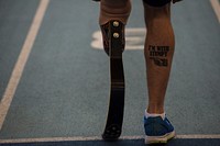 U.S. Navy Hospital Corpsman 3rd Class Redmond Ramos warms up before competing in the athletics portion of the Invictus Games at the Lee Valley Athletics Centre in London Sept. 11, 2014.