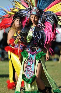 Producing an “explosion of colors", generations of Native Americans from various tribes displays their respective regalia and honors their heritage during the inter-tribal open dance at the Native American Veterans Association's Annual Veterans Appreciation and Heritage Day Pow Wow in South Gate, California, Nov. 8th and 9th.