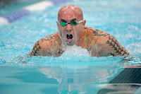 U.S. Navy Hospital Corpsman 1st Class Jamie Sclater, with the Marine team, swims to win the gold in his division of the 50-meter breaststroke event finals during the 2014 Warrior Games at the U.S. Olympic Training Center in Colorado Springs, Colo., Sept. 30, 2014.