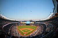 Two U.S. Air Force F-16C Fighting Falcons from the New Jersey Air National Guard's 177th Fighter Wing fly over Yankee Stadium.